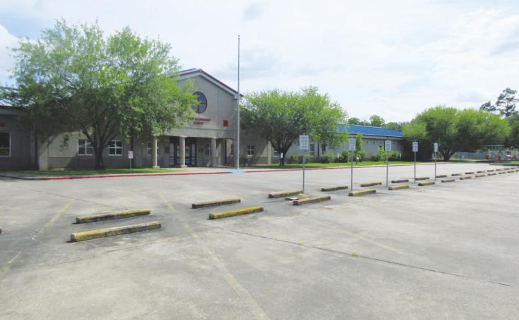 Photo by George Garza The empty parking lot on a school afternoon is evidence that student have been released from school in light of approaching tropical disturbances. The Superintendent of School says families should be together during these uncertain times.