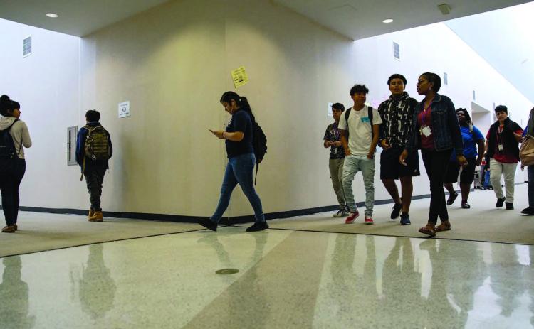 High school students walk to an after-school science tutorial that provides additional support for students taking the STAAR test at Elsik 9th Grade Center on April 19, 2018. Credit: Pu Ying Huang for The Texas Tribune