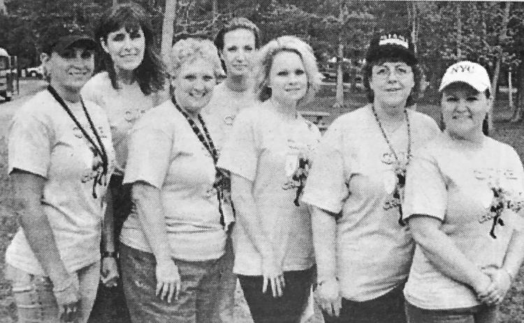 Pictured are VMS staffers, front, Lori Matthews, Debbie Rhodes, Shanna Granger, Susan Richards, Cheryl DuPuy: back, Dana Bourque and Kim Isom. In April, Vidor Middle School Students and staff put a 'CAP ON CANCER'. The $1 donation helps support the VMS Relay for Life Team. Archive Photo