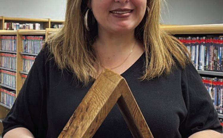 The winner of the Vidor Public Library drawing for the oak book stand is Tamra Barney. The book stand was donated to the library by Chris Screws of 1 of 99 Woodcrafts. The proceeds will help support the Summer Reading Program 2023. Courtesy Photo