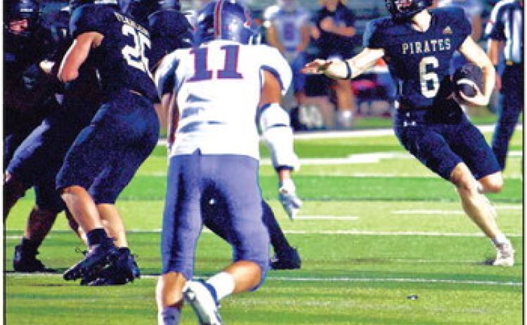 Dane Villadsen cuts back to an open running lane in Friday’s 48-3 blowout win over the TCA Trojans. Photo by Randall Luker