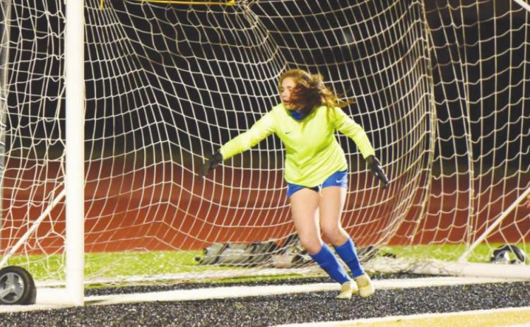Lady Pirate Jaden Lee watches as a shot to the corner slips by the Kelly goal keeper for a Vidor score