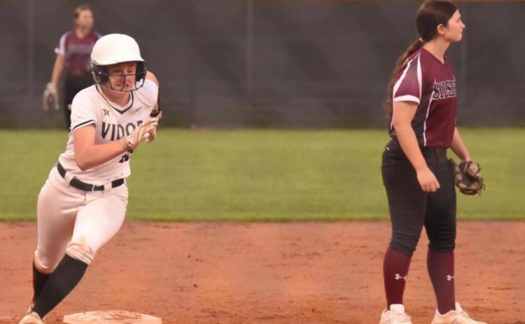 Natalie Morrison lights the afterburners as she sprints for home plate and a score in Tuesday’s game versus Silsbee. Photo by Randall Luker