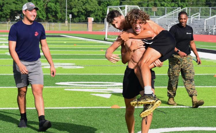 Pirates endure heat, US Marines workout