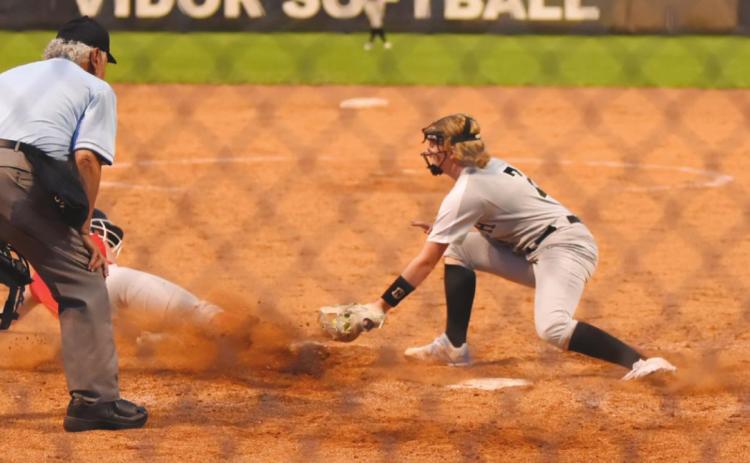 Natalie Morrison stops the steal at home plate in Friday’s home game versus the Lady Cardinals.