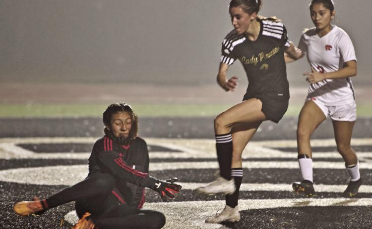 Bull scores Taylor Bull scores past the Lady Wildcats fallen goalkeeper Tuesday night. Bull led the Lady Pirates in scoring with three.