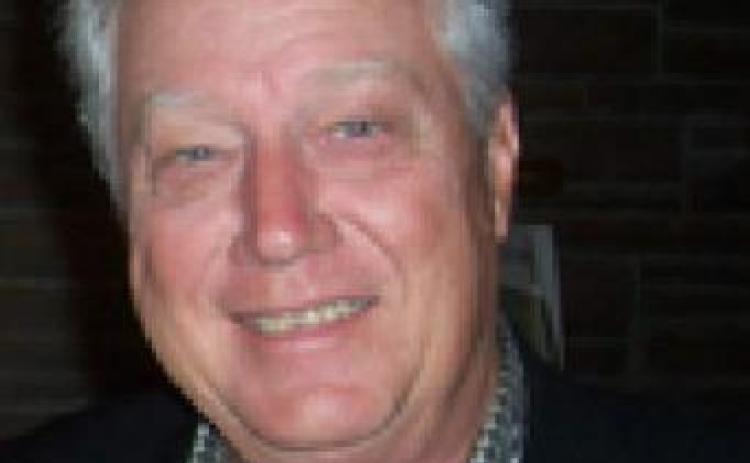 Ask Rusty – My Husband Still Works; Must He Enroll in Medicare at age 65?