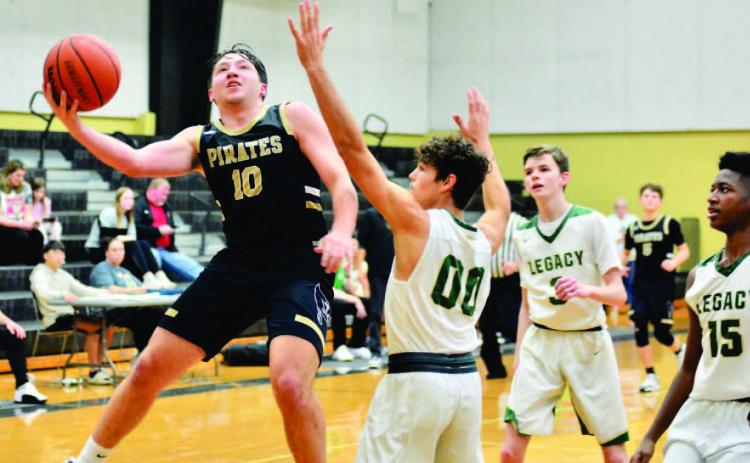 Camden Young scores in the Legacy game Saturday in Nederland.