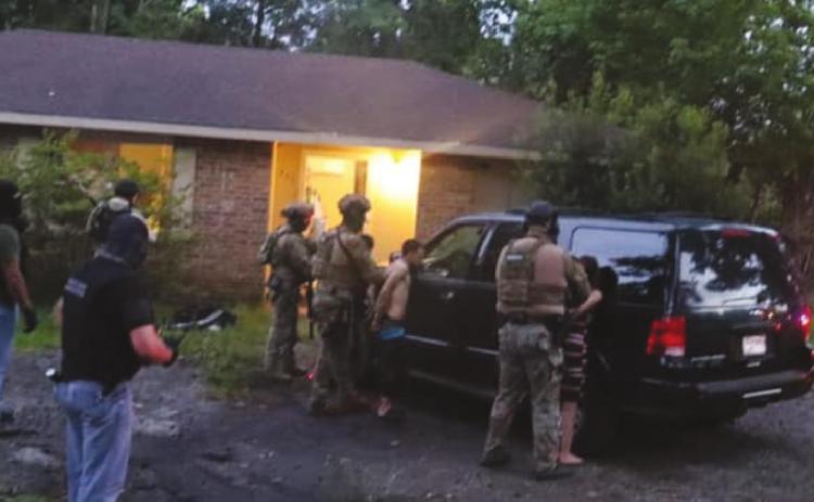 Bluebird Street raid nets heroin, methamphetamine