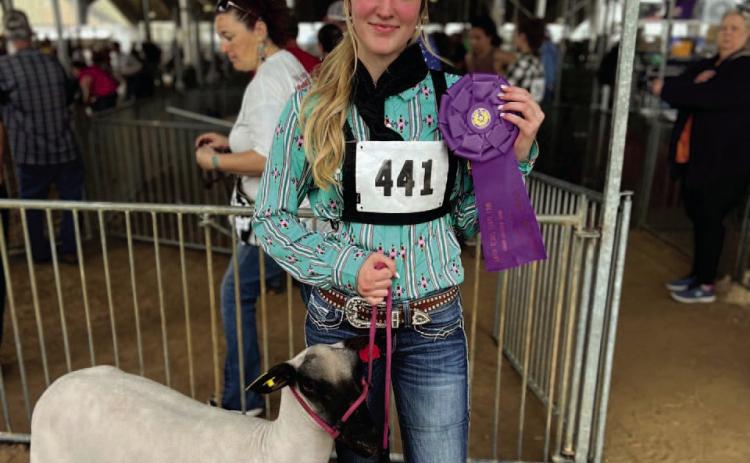 Laikyn Reese was Champion Lightweight Market Lamb and 10th Overall.