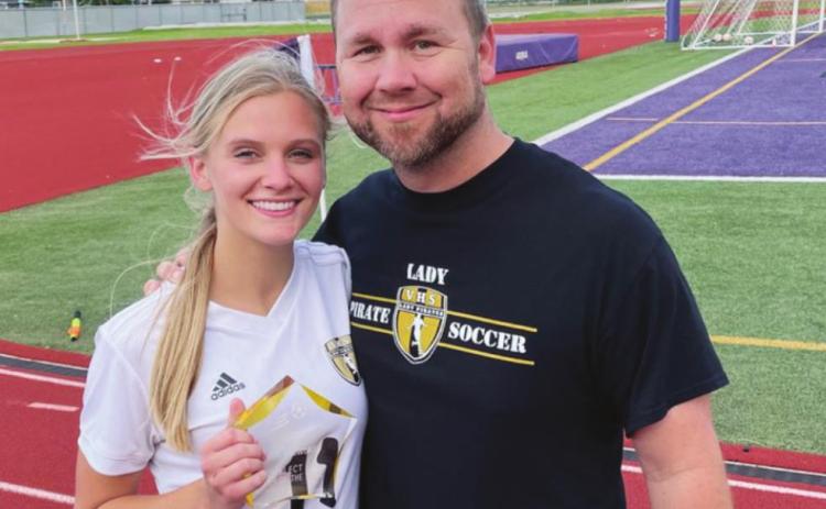 Brooklyn Healy with Vidor Head Girls Soccer Coach Ralph Fields.