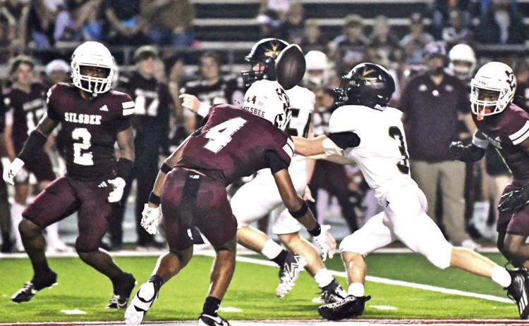 Landon Jones didn’t break stride as he regained control of the ball a Silsbee player had hit and knocked out of his grasp on his way to a first down.