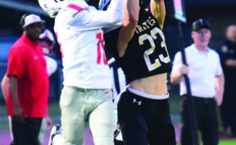 Dane Villadsen breaks up a Wildcat