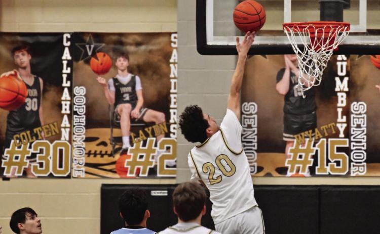 Bryson Aguilera, just moved up from jv, lays up two before the half.