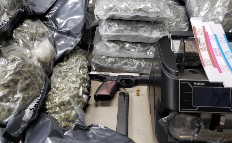 Driver crashes flees leaving weed and stolen pistol