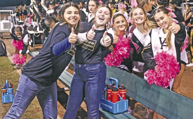VHS varsity cheerleaders and athletic trainers were in high spirits Friday after Pirates’ three touchdown 3rd quarter that propelled Vidor to a 31-21 district win over the Livingston Lions.