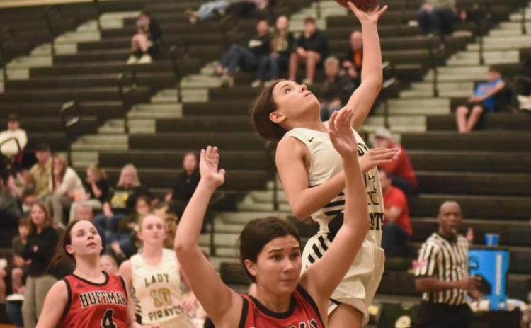 Lady Pirate Sofia Rodriguez takes her shot in Friday’s game versus Huffman. Photo by Randall Luker