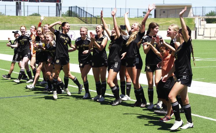 The Lady Pirates join with fans to sing VHS’ school song, Hail Alma Mater following the team’s victory over the Giddings Lady Buffs.