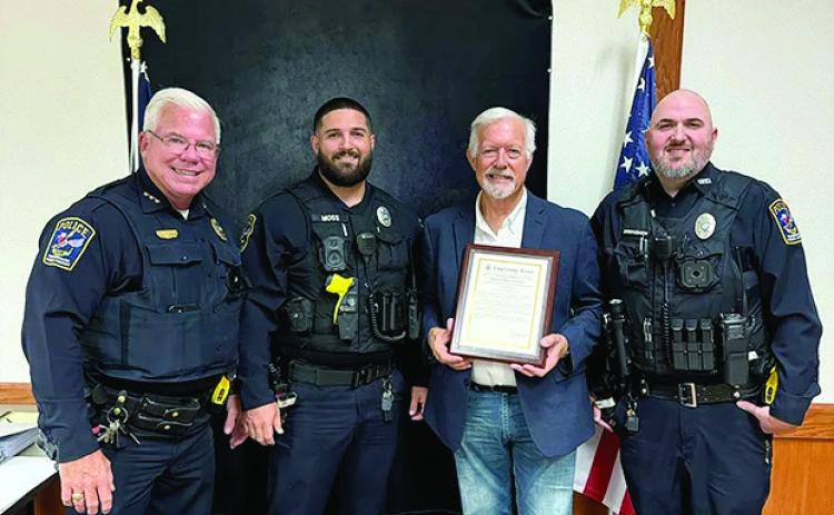 Heroes recognized Congressman Randy Weber stopped in Vidor last week to recognize two local heroes. Vidor Police Department officers Moss and Stephenson were recognized for saving two children trapped in a burning home in Vidor on September 10. Pictured are, Vidor Police Chief Rod Carroll, Officer Moss, Congressman Randy Weber, Officer Stephenson