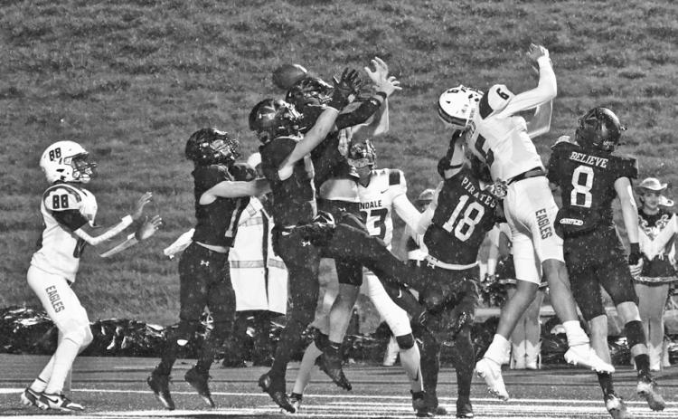 Up for grabs Pirate defenders outnumbered Eagle receivers five to three in the end zone but the last man in line, Chad Ward, #88, caught the deflected ball for a Lindale touchdown with seconds left in the first half.