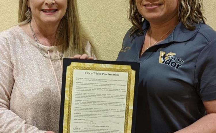 Pictured is Mayor Misty Songe presenting CTE Director Penny Singleton with a signed Proclamation Document. VISD Courtesy Photo