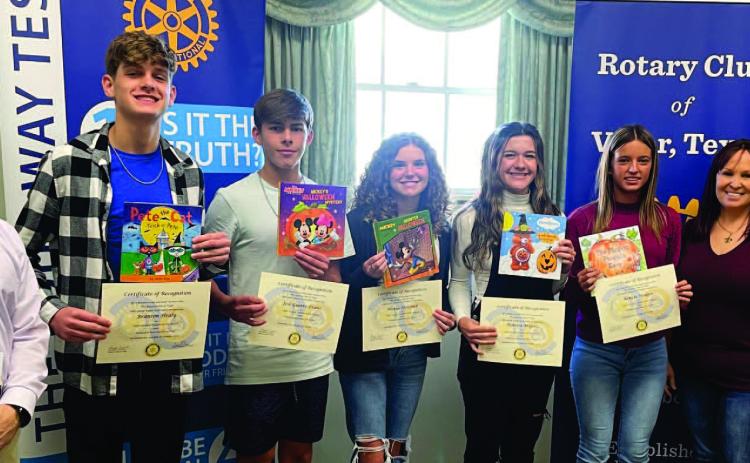 The Rotary Club of Vidor recognized the September Vidor High School Students of the Month at Their Monday luncheon. Each student received a certificate and a book that is placed on the Rotary Green Bus in their honor. Pictured: Dr. Jay Killgo, Branson Healy (junior), Jose Guerrero-Evans (sophomore), Alexus Holcomb (sophomore), Marissa Majors (senior), Kenzie Hodges (freshman), Angela Bryant (Rotary president), and Dr. Malveaux (VHS assistant principal). Courtesy photo