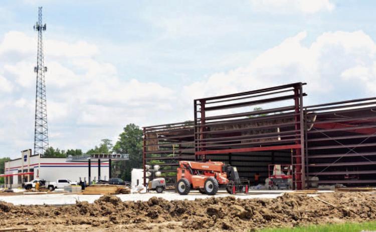 The SE corner of the Highway 12-FM 1132 intersection is a construction hotspot with two commercial properties being developed currently. A Valero gas/convenience store, background, is making progress after a delay in the availability of underground gas tanks slowed construction while its neighbor in the foreground will be a Family Dollar/Dollar Tree Combo store. Courtesy Photo