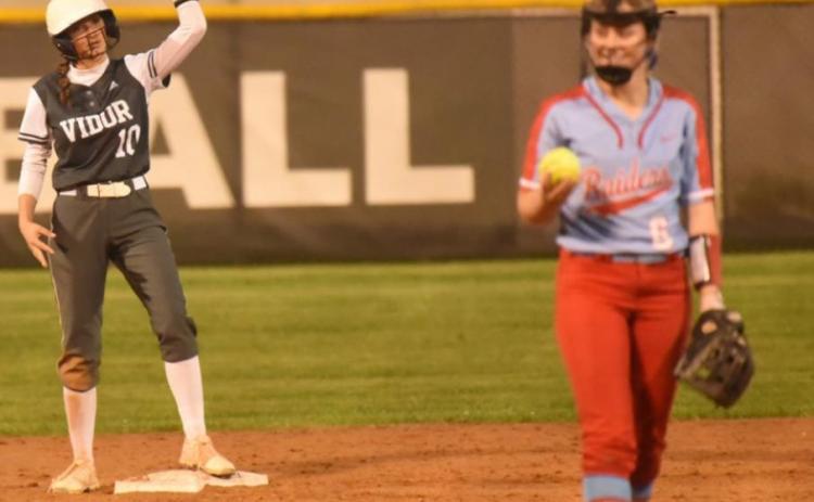 Andrea Garrett celebrates after hitting a double. Photo by Randall Luker