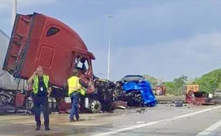 A Louisiana woman was killed when her vehicle crashed into this jacknifed 18 wheeler on IH-10 Monday. Courtesy Photo