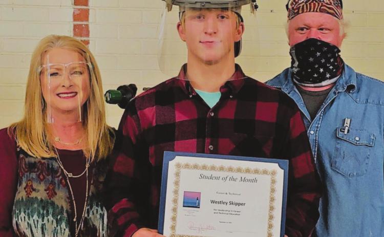 Director of CTE Penny Singleton, Westley Skipper, Welding Teacher Jason Bingham.