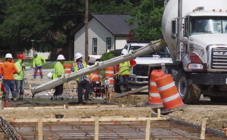 Workers dodge showers and downpours as work on Orange Street and drainage projects continue near Vidor High School. Vidor ISD said he had not received a recent estimate for completion of the project but he was hoping street work near the high school by the time school starts for the 2025-2026 school year.