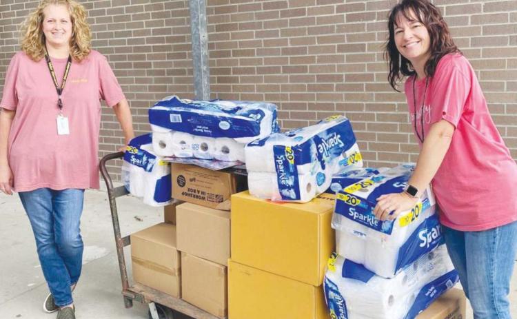 Vidor ISD teachers Holly Pruitt and Mary Majors represented the Vidor ISD at the Southeast Texas Food Bank’s School Tools Teacher Drive-Thru giveaway on Saturday and came back with this haul of goodies!!!