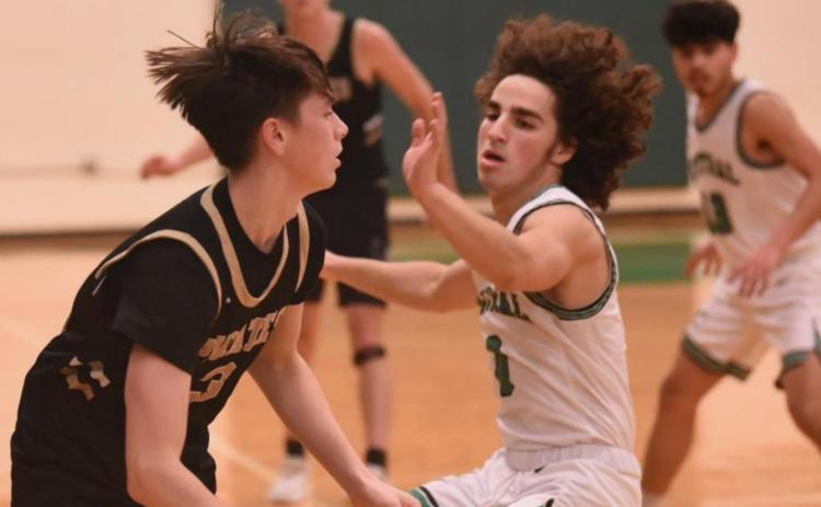 Senior Colby Eaves breaks around a Central defender in Thursday’s late game at the LCM Tournament. Photo by Randall Luker