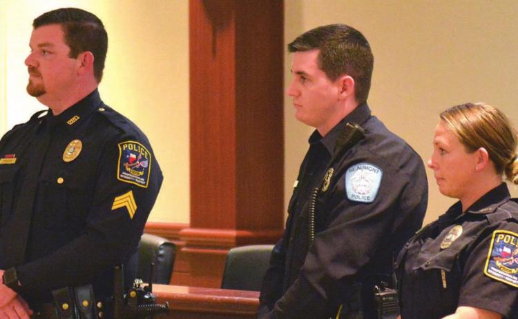 These three officers were honored with Lifesaving Awards Tuesday at Vidor City Hall for reviving a Vidor resident in December. Shown left to right are Sgt. Tom Meadows, Officer Dakota Gaines and Officer Brittany Haley. Photo by Randall Luker