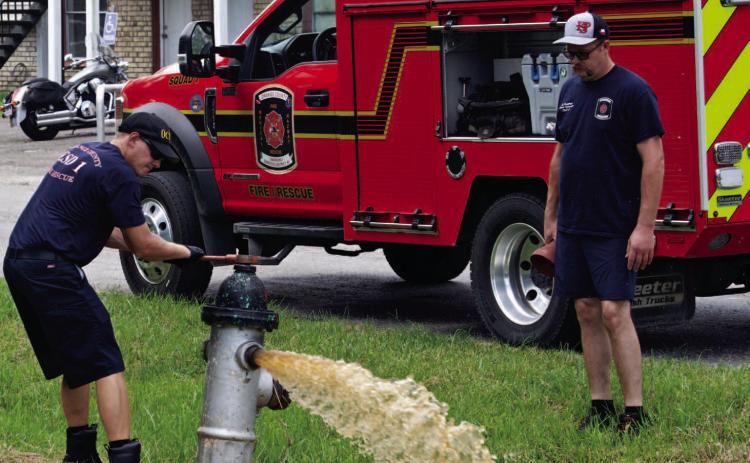 Orange County Emergency Services District #1’s newest employee Austin Powell, left, and Driver/ Operator Richard Hughes were busy Tuesday conducting an annual test of the fire district’s hydrants function and flow, plus maintenance, if needed. Due to their diligence, Vidor’s ISO insurance rating has improved, lowering residents’ home insurance premiums.
