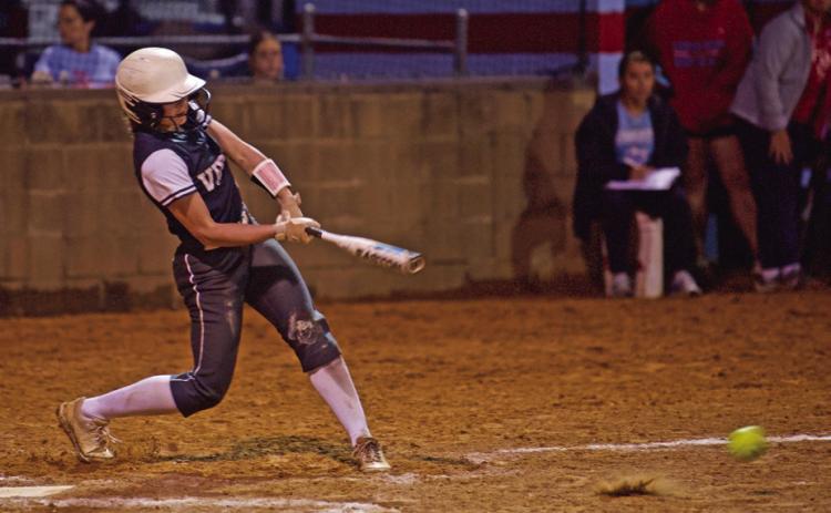 Jaylen Welch hits a grounder versus Lumberton.